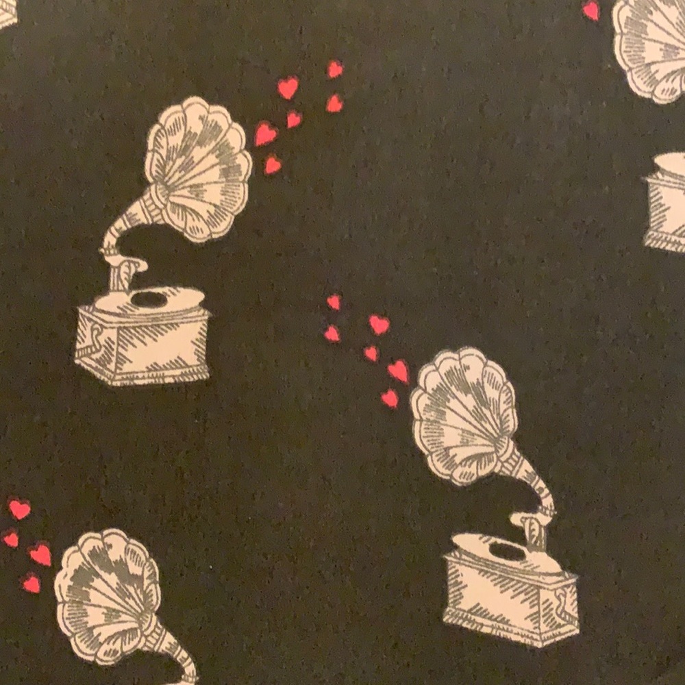 Gorgeous green dress with gramophones and hearts!